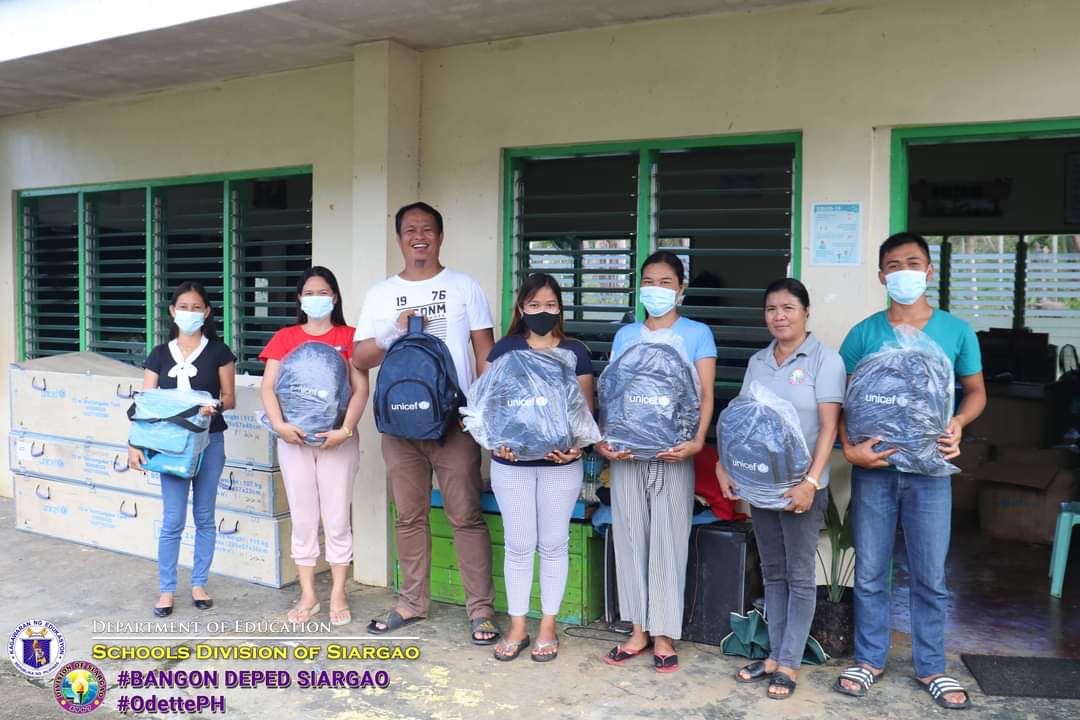 PIA - DepEd-Siargao delivers UNICEF response items to HS, elementary school