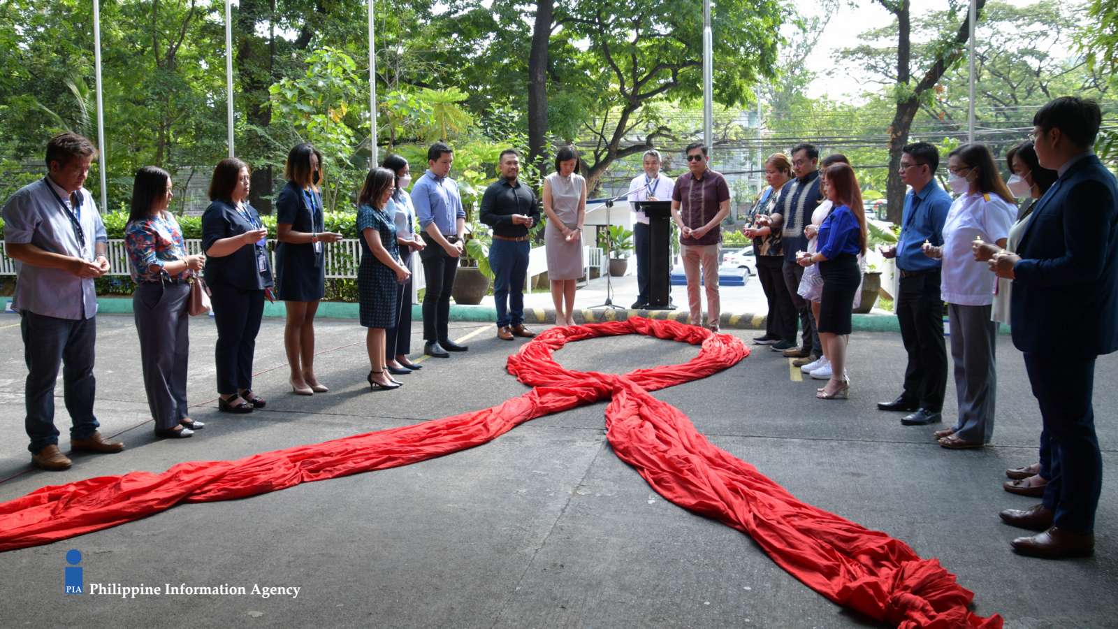 PIA lights candle to remember departed, bring hope for PLHIV