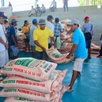 Farmer beneficiaries receive fertilizers, seeds, water pumps, and hose as assistance funded under the RA 7171 share of the town.