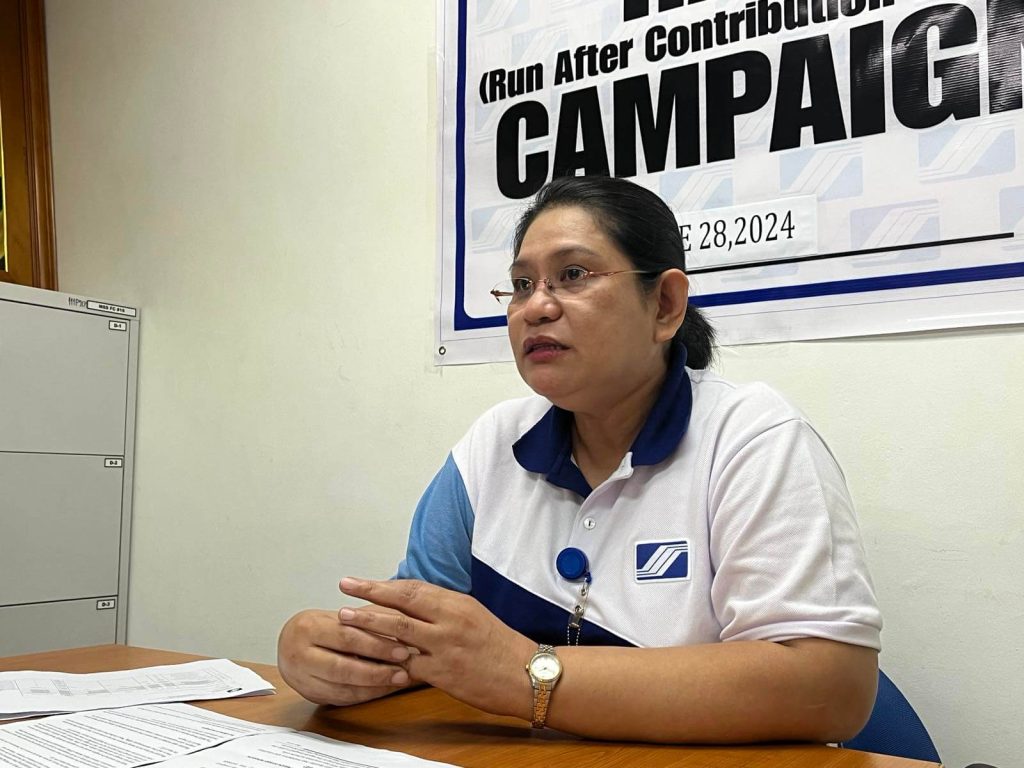 Social Security System Cabanatuan Assistant Branch Head Maria Fe Abraham encourages Overseas Filipino Workers and self-employed individuals to take advantage of the MySSS Pension Booster to enhance their monthly pension upon retirement. (Maria Asumpta Estefanie C. Reyes/PIA 3)