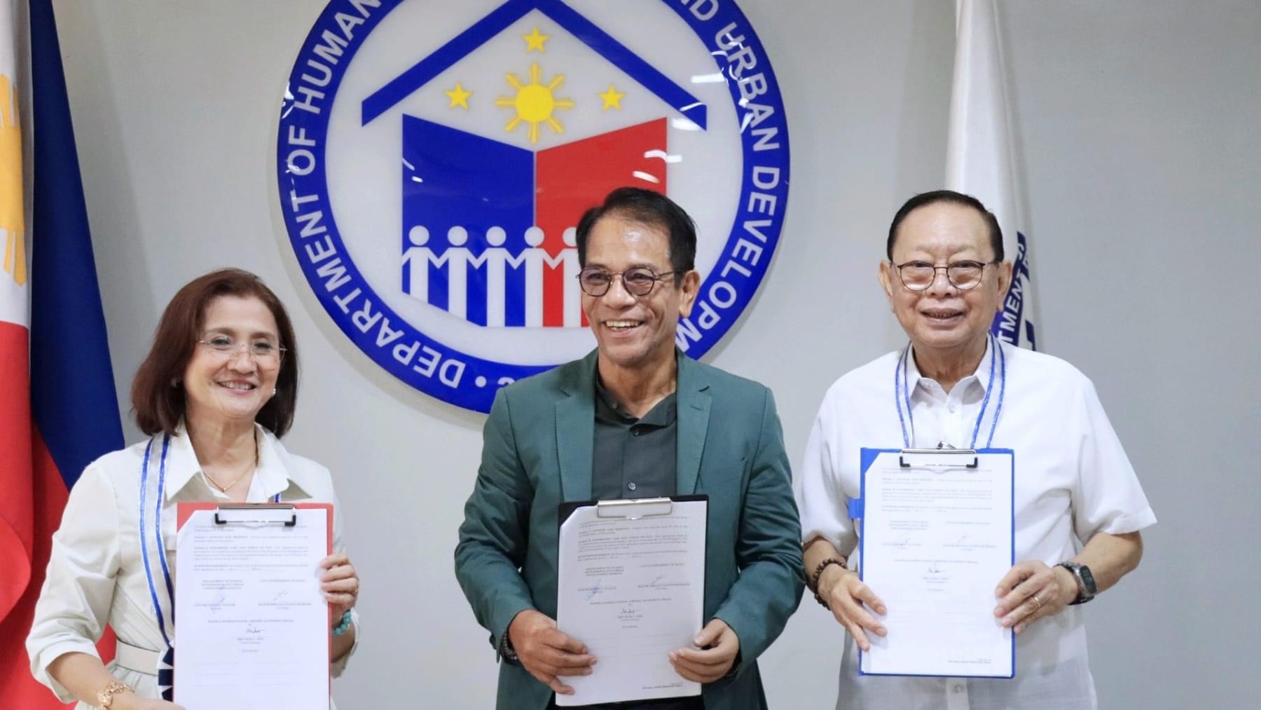 Photo caption: DHSUD Secretary Jose Rizalino Acuzar signs an agreement with Pasay City Mayor Imelda Calixto-Rubiano and MIAA General Manager Eric Jose Ines. (Contributed photo)