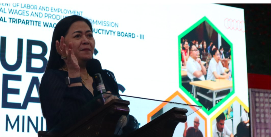 Regional Tripartite Wages and Productivity Board Chairperson and Department of Labor and Employment Regional Director Geraldine Panlilio delivers her message during the Public Hearing on Wage Adjustment in Central Luzon, as she thanks the various sectors who attended the event. (RTWPB)