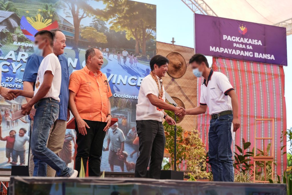 President Ferdinand Marcos Jr. led the distribution of financial assistance to 10 former rebels through the PAyapa at MAsaganang PamayaNAn program of the Department of Social and Welfare Development-10 during the declaration of Misamis Occidental an insurgency-free province on September 27 at Tangub City, Misamis Occidental. (Photo courtesy of PCO)