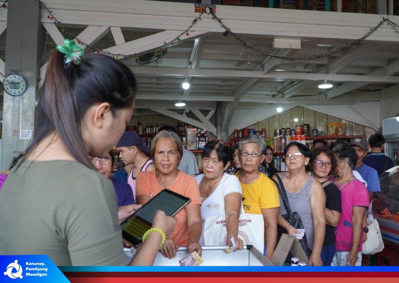 Beneficiaries use their AKAP Rice identification cards to purchase rice at a 50 percent discount from accredited retailers across the province. (Photo courtesy of LGU Camiguin)