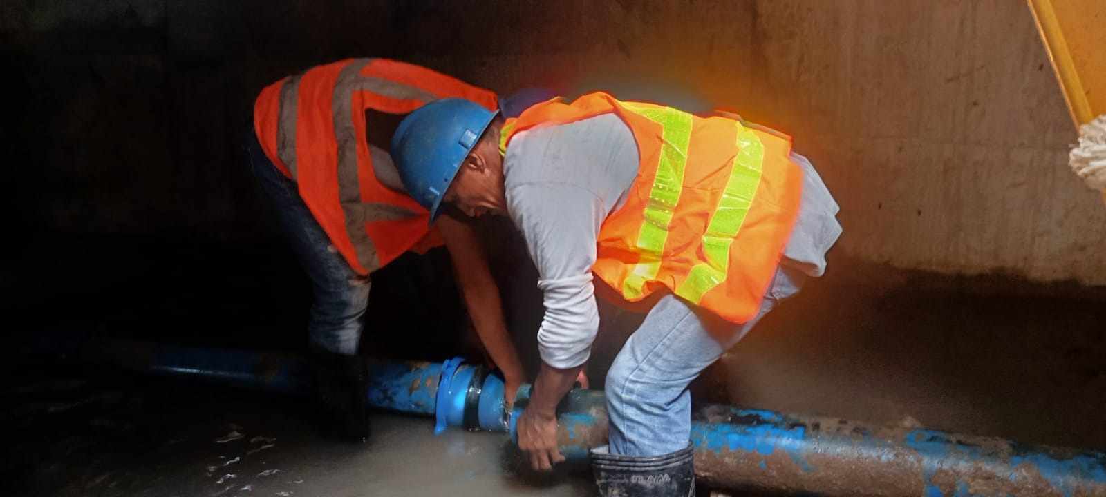 The technical team of the Camiguin Water Company conducts a mainline leak repair at Tupsan Pequeño, Mahinog. (Photo courtesy of CWC)