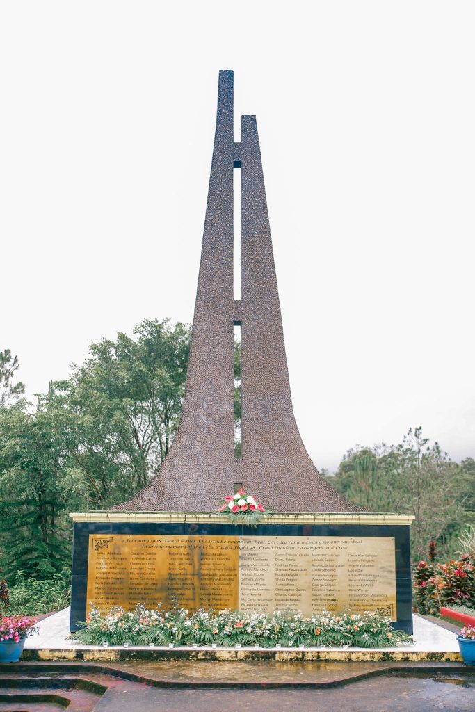 Ang 20-foot nga istraktura, gipahinungod kini sa mga nakabsan sa kinabuhi paagi sa Cebu Pacific Flight 5J387 nga trahedya niadtong 1998. Ang maong shrine usa sa mga atraksyon karon sa lungsod sa Claveria, Misamis Oriental. (Photo courtesy of Misamis Oriental Provincial Tourism Department)