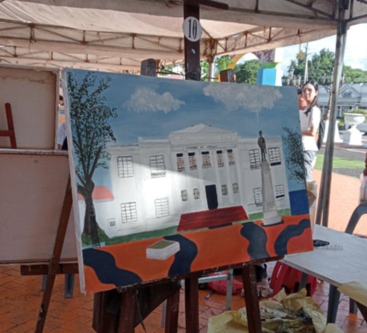 In the eyes of Mikaela Keilah Sophia Lopez from Sorsogon Pilot Elementary School and winner of Pintahusay, Elementary Category, this painting of Sorsogon's Capitol Building is a testament of their young generation's creativity, passion for art, and love for their culture. (Photo: Romell Baria, PIA 5/Sorsogon)